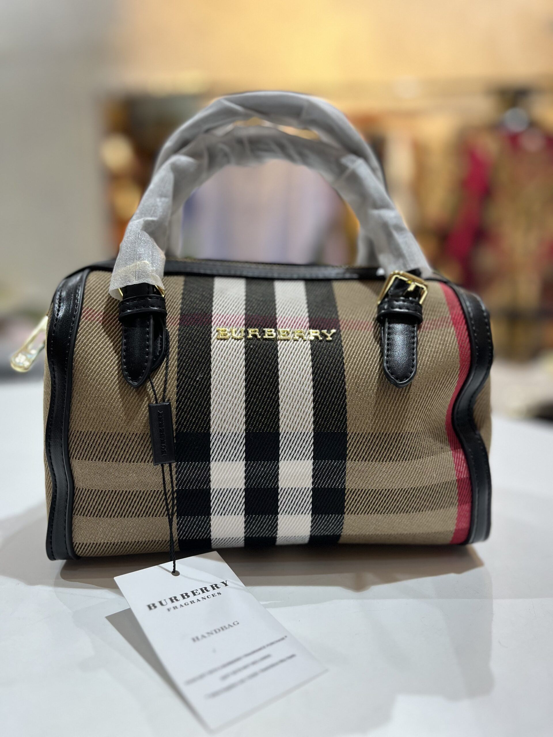 burbery print duffl burbery print duffl